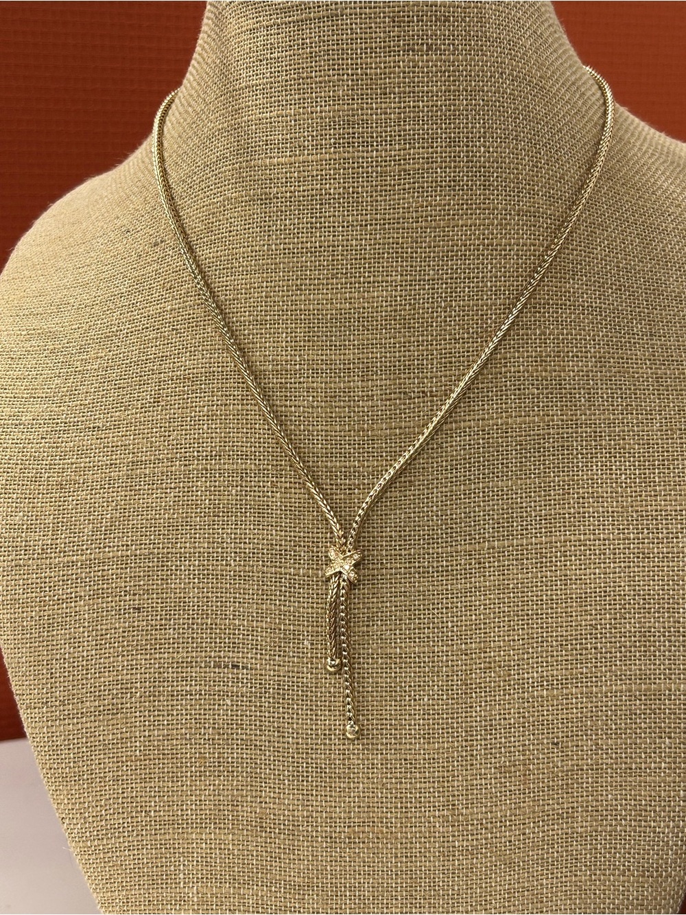 Gold Tone and Rhinestone Lariat X Necklace